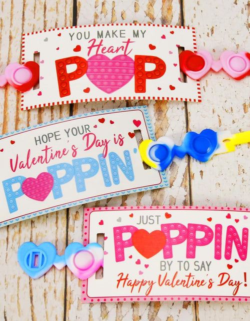 Load image into Gallery viewer, 24 Pack Valentines Cards with Heart POP Bracelets
